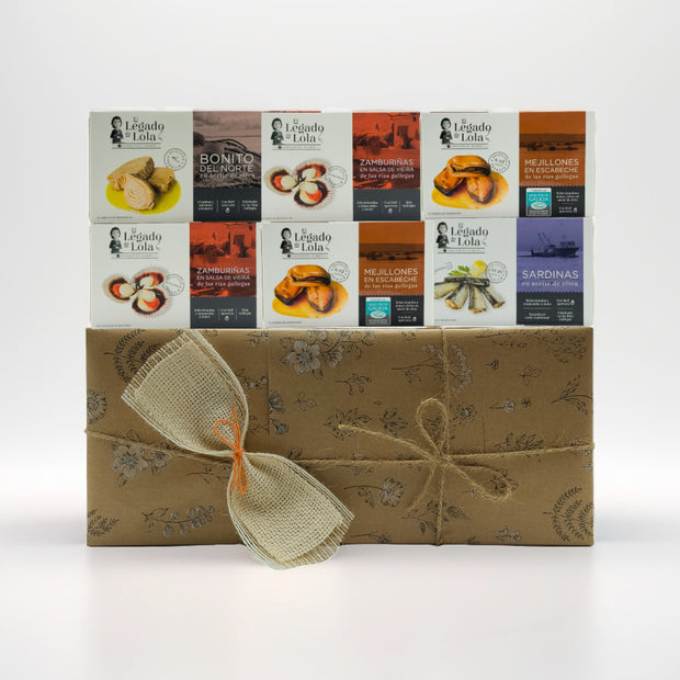 Caja de regalo edición limitada con conservas artesanales de Galicia, ideal para regalar, regalo de empresa o disfrutar en buena compañía.