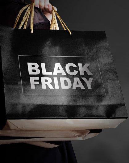 Bolsas negras de la compra con la palabra Black Friday